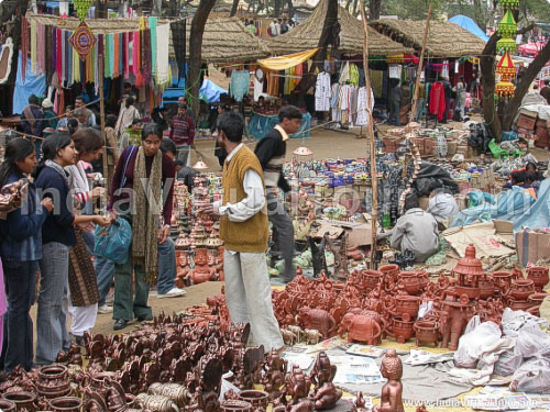 Shopping at stall of terracotta crafts