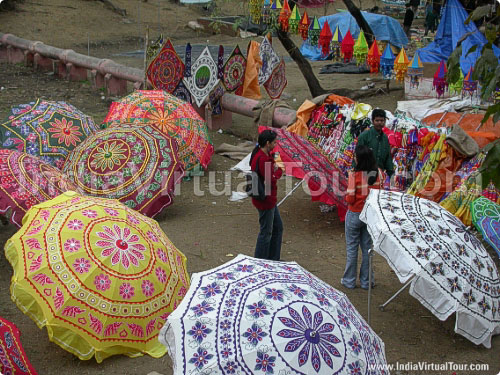 Colorful embroidered umbrellas ideal for lawns, roofs etc.