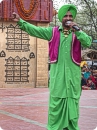 Visitors enjoying cultural programe by artists from Vrindavan