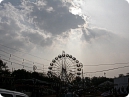 Sun is also trying to view fair ground beyound the clouds