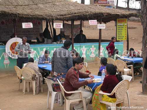 Visitors enjoying foods of different states in fair